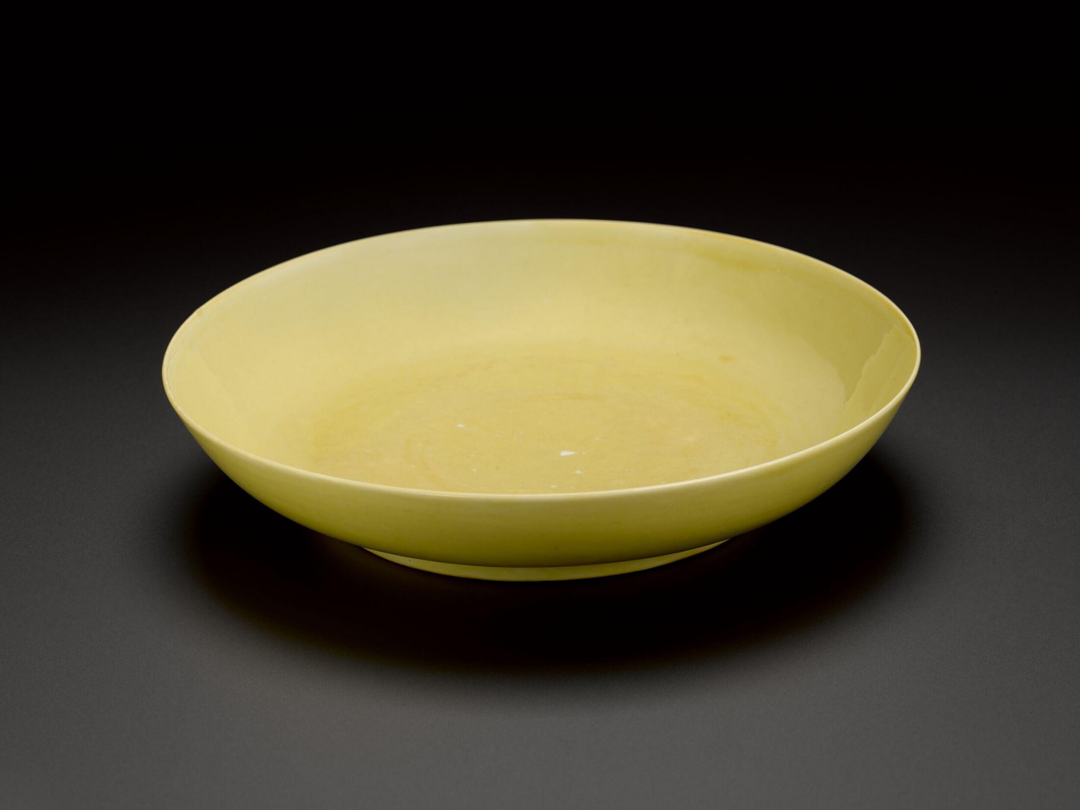 Plain Yellow dish, inscribed (not pictured) with the name of the Mughal Emperor Jahangir