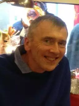 Photo of Gervase Rosser smiling to camera.