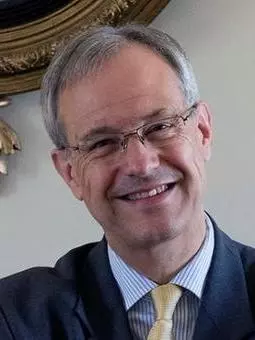 Headshot of Steven Gunn smiling to camera