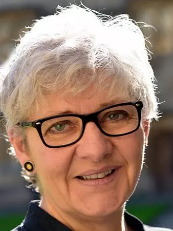 Photo of Lorna Hutson standing outside smiling to camera