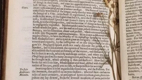 Jonson's Workes (1641) with flowers pressed.