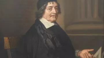 Thomas Barlow pointing at a book