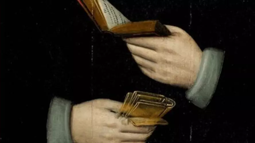 A detail from the cover of Lay Learning and the Bible, showing two hands holding small books