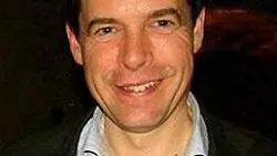 Photo of Jonathan Thacker smiling to camera