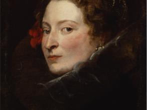 Depicts pale white woman looking to the left with a red flower behind her ear. Flushed cheeks and red lips.